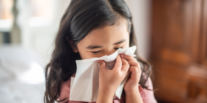 child sneezing