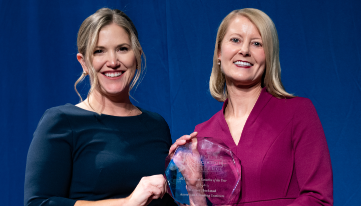 Melissa receiving award